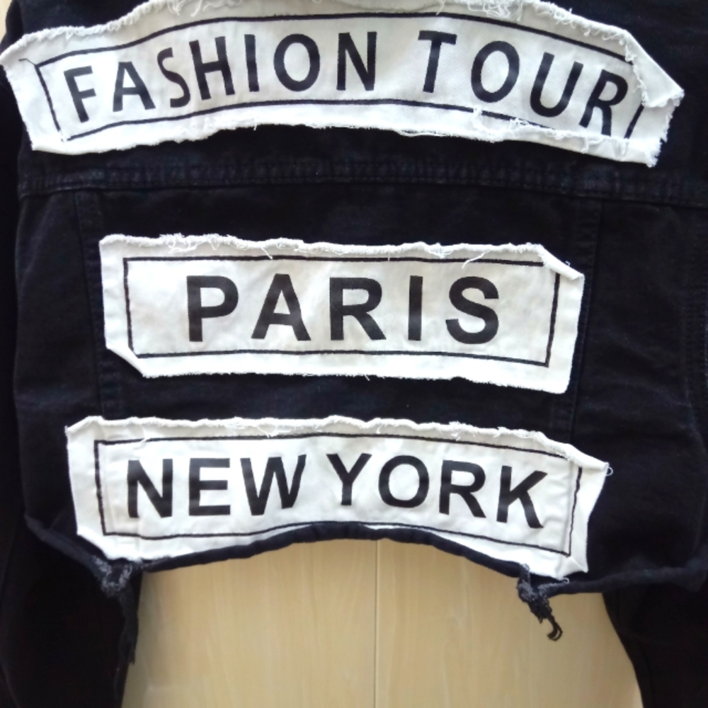 American Bazi cropped fashion tour jean jacket.